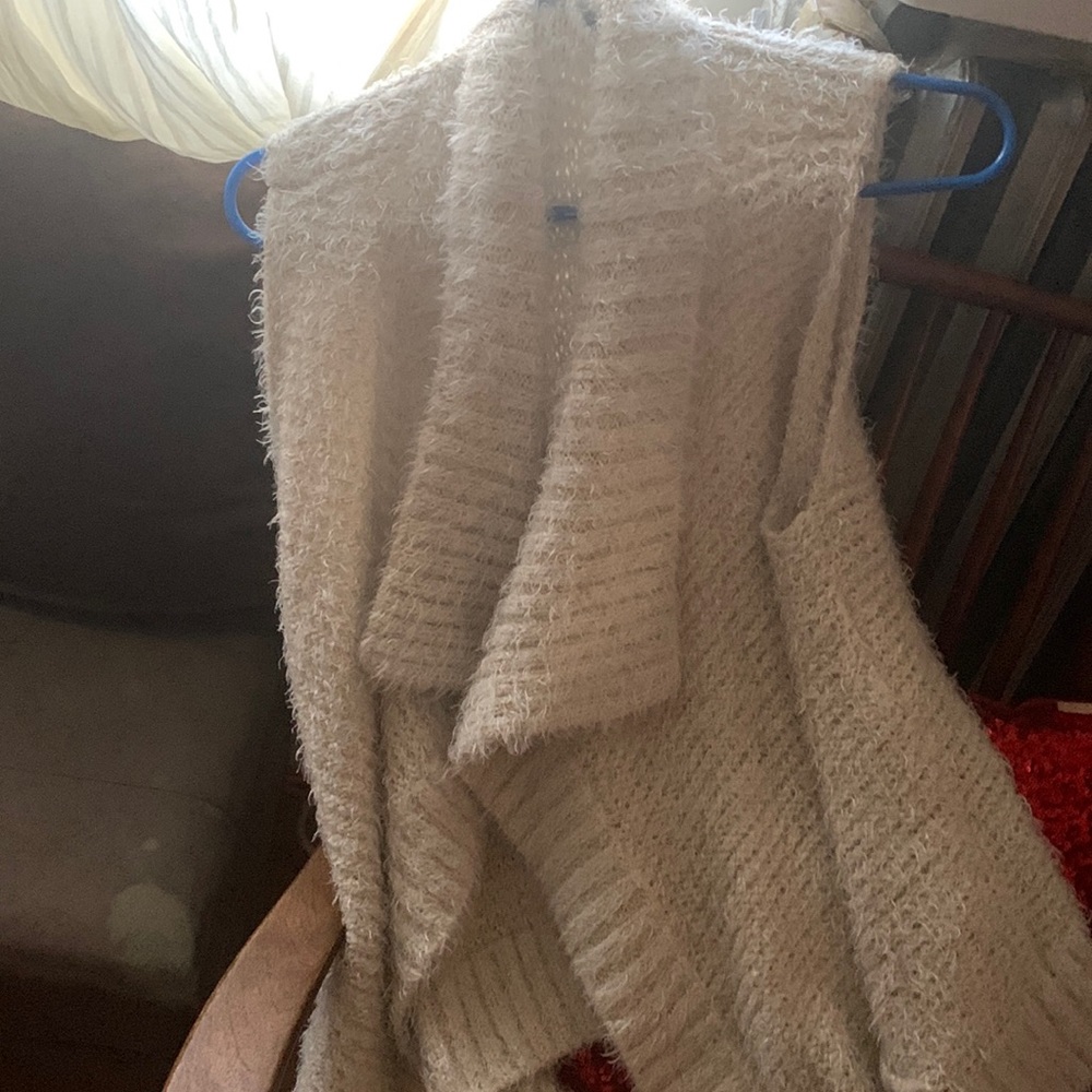 Nice sweater vest will go with anything